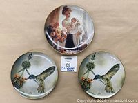 Group view of all three Hamilton porcelain plates