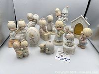 Group shot of all 12 Precious Moments pieces