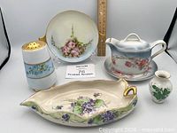 Group shot of all five porcelain items displayed together
