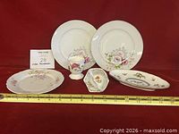 Group shot of all six porcelain pieces
