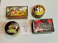 Top view of four tins showing lid artwork
