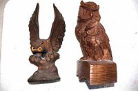 Front view two carved wood owls