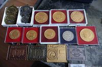 Group of all medals and plaques displayed