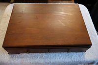 Closed wood flatware chest top view