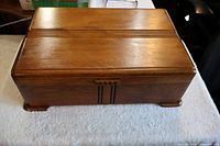 Closed wooden flatware chest top view
