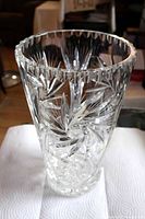Full view of crystal vase showing cut pattern and height