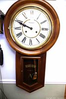 Full view of Westminster wall regulator clock on wall