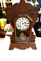 Full view of carved wood gingerbread clock