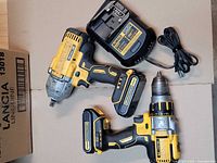 Impact wrench, hammer drill/driver, charger, batteries