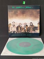 Front outer sleeve with green vinyl partially visible