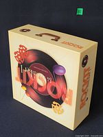 Closed game box front showing title graphics