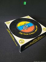 Front of boxed Roll the Rock Rock 'n' Roll Trivia Game