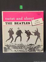 Front jacket showing album title, band photo and Capitol logo