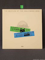 Front cover showing album title and ticket graphics