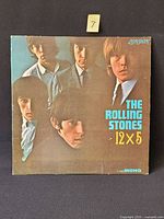 Front cover with band image and title