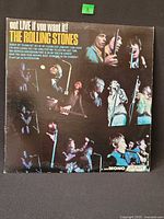 Front jacket showing album title and performance photos