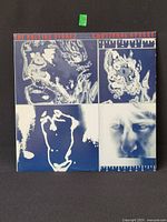 Front cover with thermal-image artwork and album title