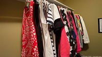 Rack of assorted women’s garments showing multiple colours and patterns