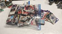 Plastic bag filled with hockey trading cards on table