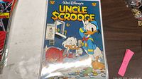 Front cover of Uncle Scrooge comic #304 in sleeve