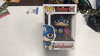 Front view of boxed Funko Pop Captain America figure