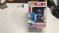 Front view of boxed Funko Pop! Captain America showing figure and packaging details