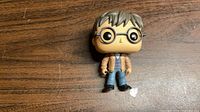 Front view of loose Funko Pop Harry Potter figure showing outfit and glasses