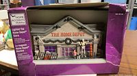 Front of boxed porcelain Home Depot store