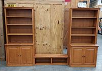 overall view of two bookcase cabinets and bridge shelf