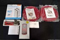 All items laid out including bag rolls, silicone mats, thermometers, measuring spoons and recipe cards