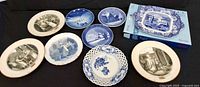 Group shot of all eight plates including boxed Spode