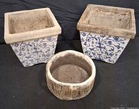 Group shot of three planters