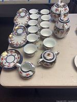 Overview of the china pieces laid out on table