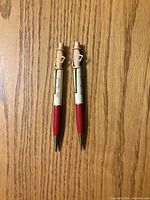 Front view showing both mechanical pencils with Mr. Peanut toppers and branding