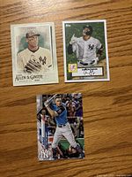 Fronts of three Aaron Judge Topps baseball cards