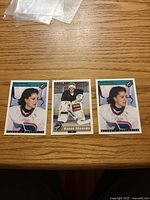 Front view of three Manon Rhéaume Classic hockey cards