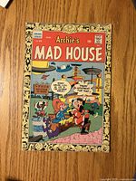 Front cover showing title, issue number 48, August, 12¢ price