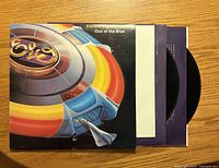 Front cover showing album artwork and inner sleeves with both vinyl discs partially visible