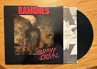 Front album jacket with vinyl and inner sleeve partially visible