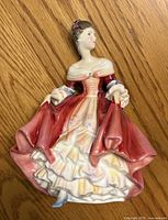 Front view of Royal Doulton Southern Belle figurine showing colors and condition