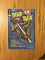 Front cover of Gold Key Star Trek comic issue 22 showing title, price, artwork and publisher logo