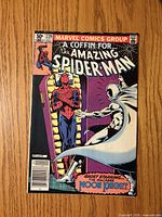 Front cover of The Amazing Spider-Man #220 featuring Spider-Man and Moon Knight