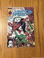 Front cover of The Amazing Spider-Man #318 showing Spider-Man battling Scorpion