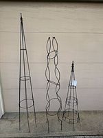 Full view of three trellises standing side by side