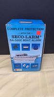 Front of boxed SECO-LARM SA-530C boat alarm kit