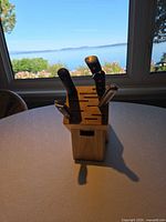 Knife block with knives inserted