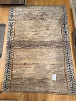 Full view of rug front showing size, color and border pattern