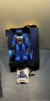 Robot, remote, manual inside original but damaged box