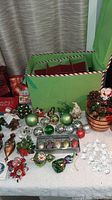 Full lot showing ornaments, corsages, storage box