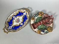 Limoges tray and lobster dish side by side showing full lot contents
